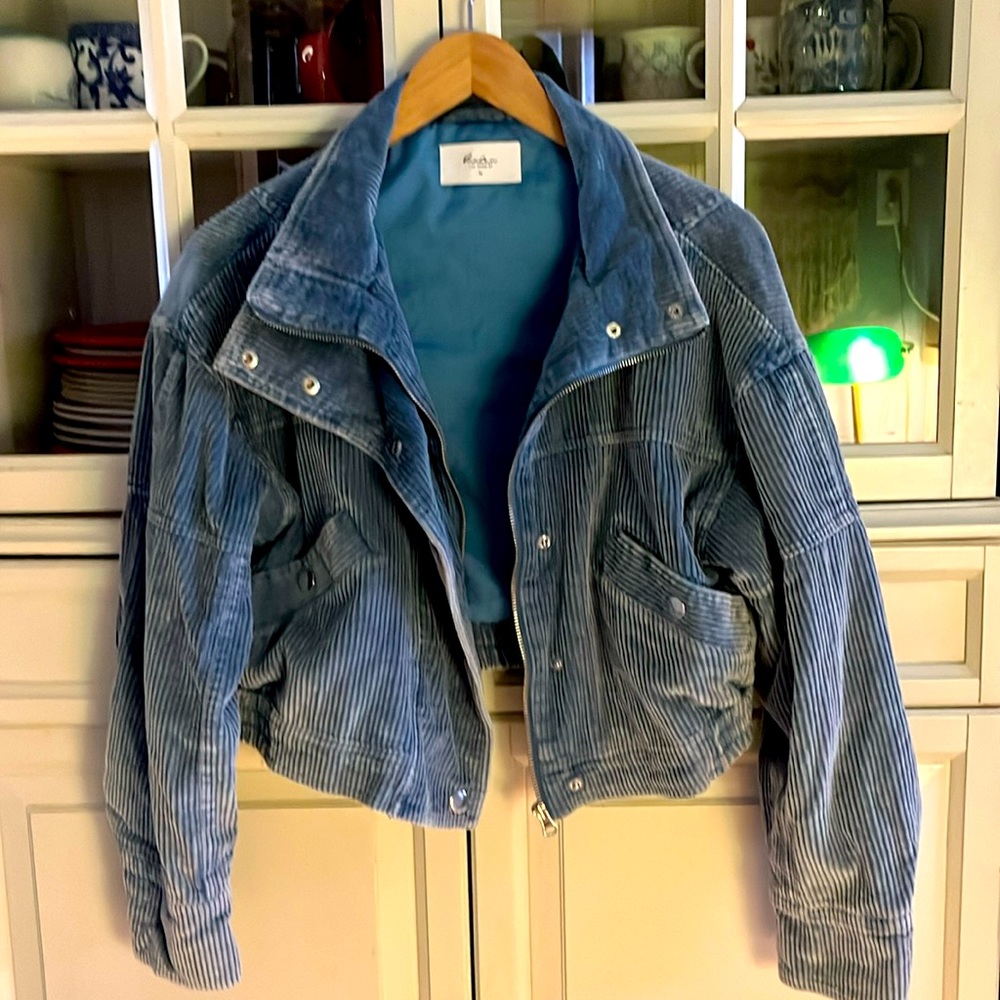 Blue corduroy cropped jacket.